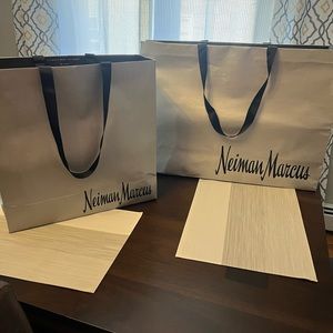 Two Neiman Marcus shopping bags